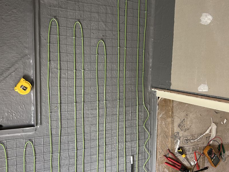 Thin mat electric heating installation photo 1