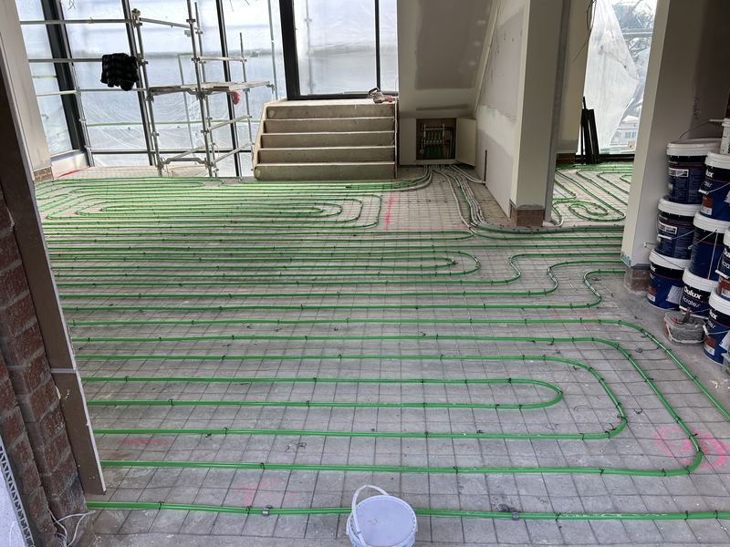 In-screed hydronic heating installation photo 3